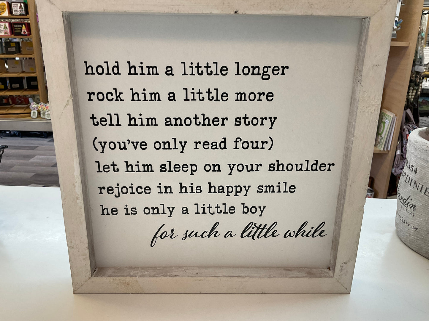 Hold Him a Little Longer Sign