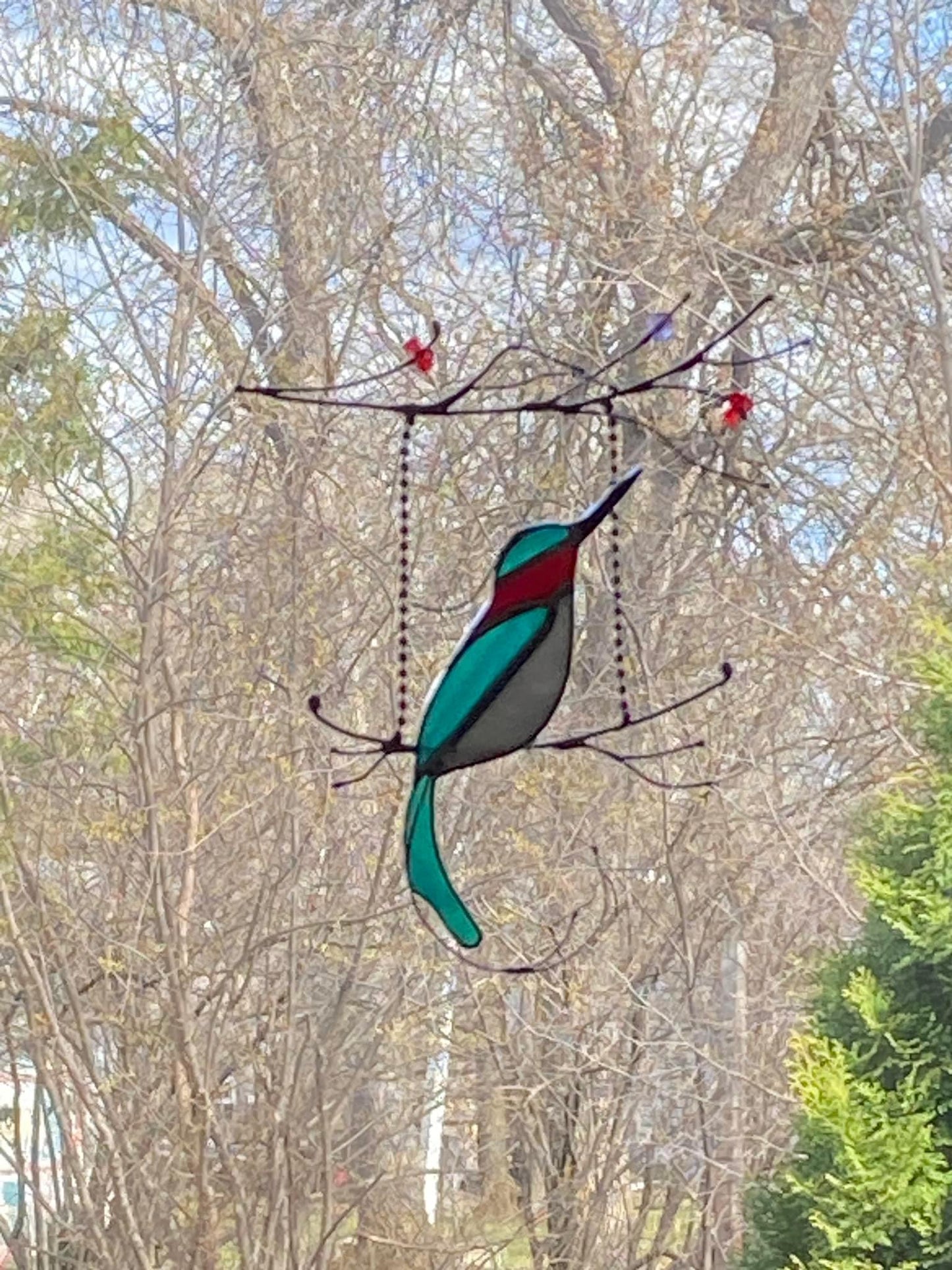Hummingbird on a Swing