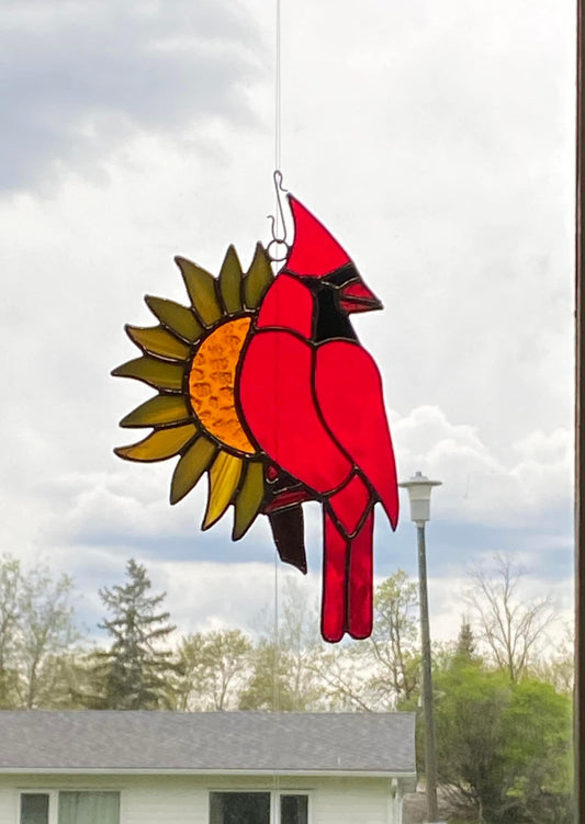 Cardinal With a Sunflower