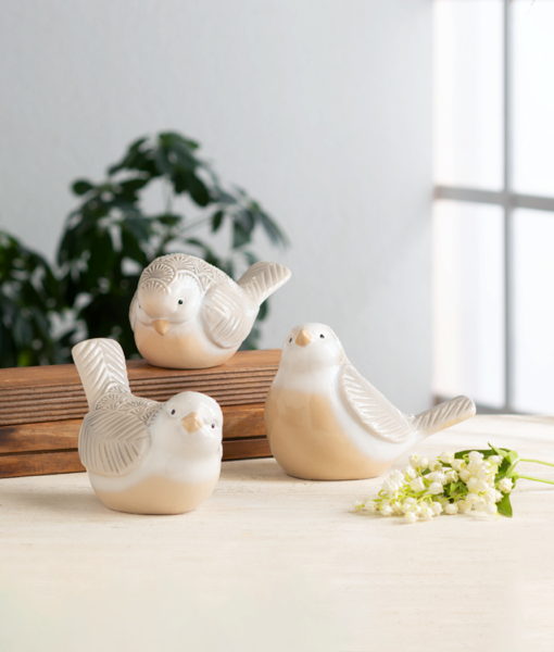 Ivory Bird with Embossed Pattern
